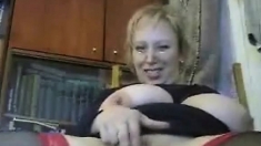 Busty blonde milf teases on cam